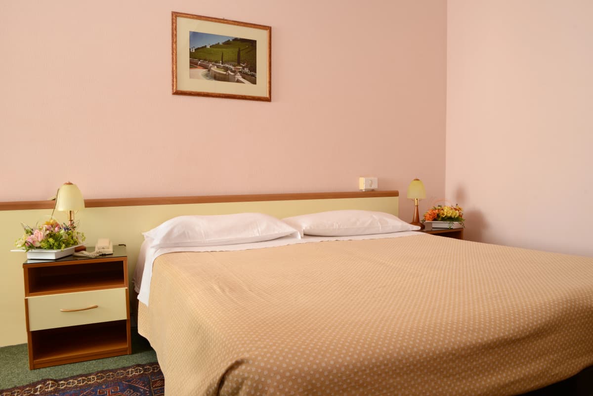 Comfortable guest room at the Bahá’í Study Center for business meeting participants